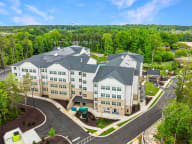 aerial view of the Active Adult building with a parking lot