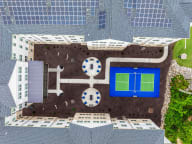 Active Adult birds eye view of courtyard and pickleball courts