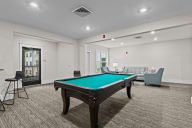 Active Adult clubhouse space with pool table
