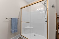Active Adult Bathroom with shower with a glass door