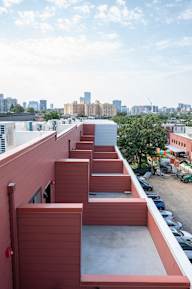 a view of the city from the roof of a building