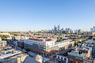 a view of the city from the roof of a building