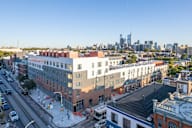 a view of the city from a roof top of a building