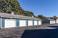 A row of garage doors are closed.
