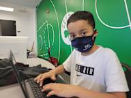 Child On Computer At Tierney Learning Center.