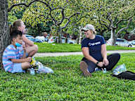 Children Playing Outside With Staff Tierney Learning Center.