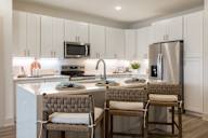 Model kitchen decor at Saltaire Apartment Homes in Santa Rosa Beach, FL
