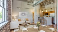 a living room in The Commons with a couch and a table