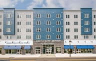 a view of the main city center building from the street