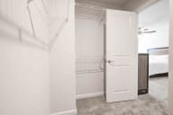 Pristine bathroom with elegant lighting fixtures and contemporary design elements throughout