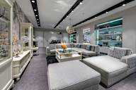 A modern furniture store with a variety of seating options.