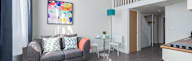 a living room with a couch and a table
