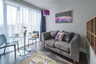a living room with a couch and a table