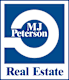 A blue and white logo for MJ Peterson Real Estate.