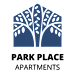 a silhouette of a tree in a blue background