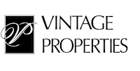  A black and white logo for vintage properties.