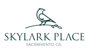 a bird perched on a branch with the skylark place logo on it