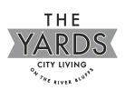 a logo for the yards city living on the river bluffs