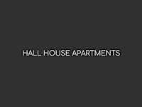 a dark room with the words hall house apartments