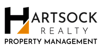 The image is a logo for Hartsock Realty Property Management.