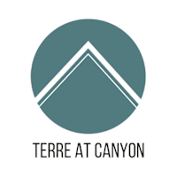 A logo with a mountain shape in the middle and the words "terre at canyon" below it.
