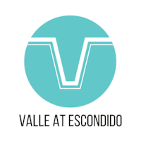 A logo with the text "Vallarta Escondido" below it.