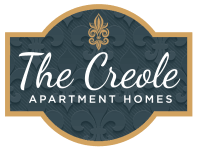 the creole apartment homes logo