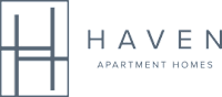 A green poster with the words "HAVEN Apartment Homes" written on it.