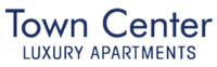 A sign that says Town Center Luxury Apartments.