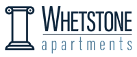 A logo for Whetstone Apartments featuring a column.