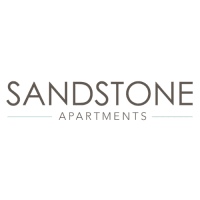 the logo of sandstone apartments on a white background