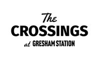 The image is a logo for "The Crossings at Gresham Station".
