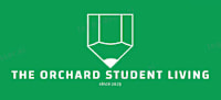 a green sign that says the orchard student living