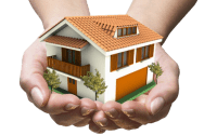 a model of a house in the palms of two hands