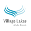 a logo for village lakes at lake orlando