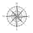 A compass rose with a green background.