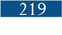 A blue and green sign with the number 219 on it.