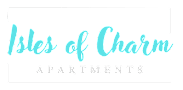 A sign that says "Isles of Charm Apartments" in a cursive font.