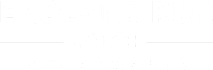 A green sign with white text that says "England Run North Apartments".