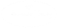 A logo with the name Alexander Crossing in white cursive font on a green background.