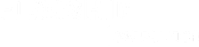 A green sign with the word "FLAGSHIP" in large white letters and the word "CARROLLTON" in smaller white letters below it.
