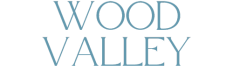 a close up of the words woolworth valley on a green background