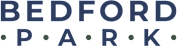 The image shows the word "BEDFORD" in large letters with a green background and a pattern of dots.