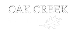 a green background with the words oak creek apartments