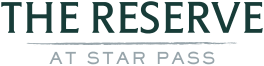 A sign that says "The Reserve at Star Pass".