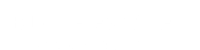 A sign that says "Blake Estates Apartments" in white text on a green background.