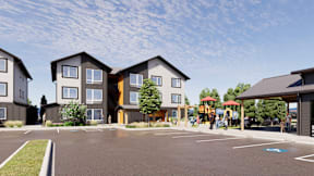 A modern building with a parking lot in front.