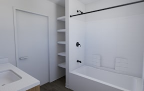 A white bathroom with a tub, sink, and shelves.
