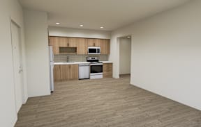 A kitchen with a refrigerator, oven, and sink is shown in the image.