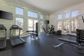 the gym at the flats at big tex apartments
